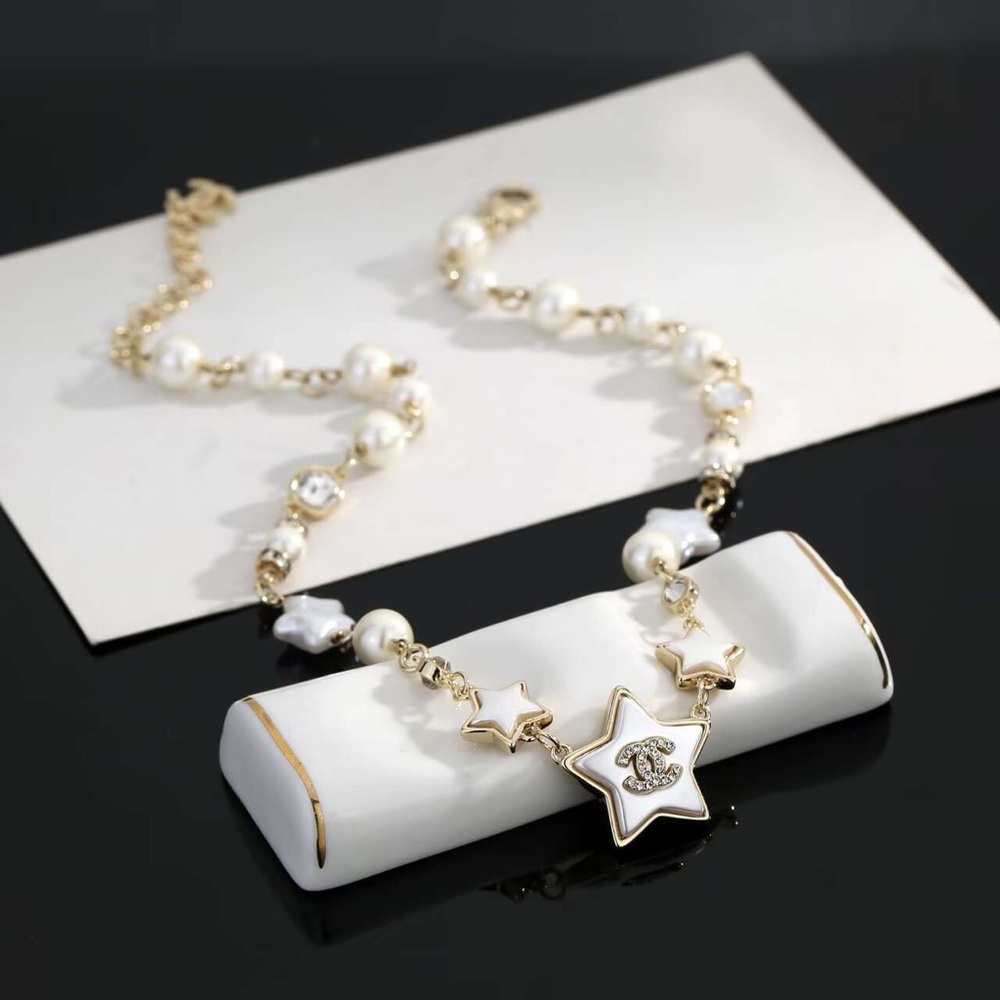 CHANEL Gold and White Star Necklace - Picture 3 of 6